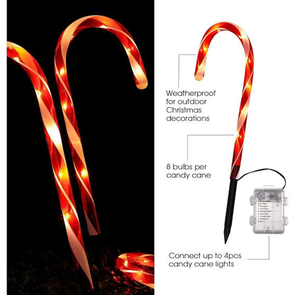 5pcs LED candy cane Christmas lights — battery-powered decorations for garden paths or indoor holiday rooms.