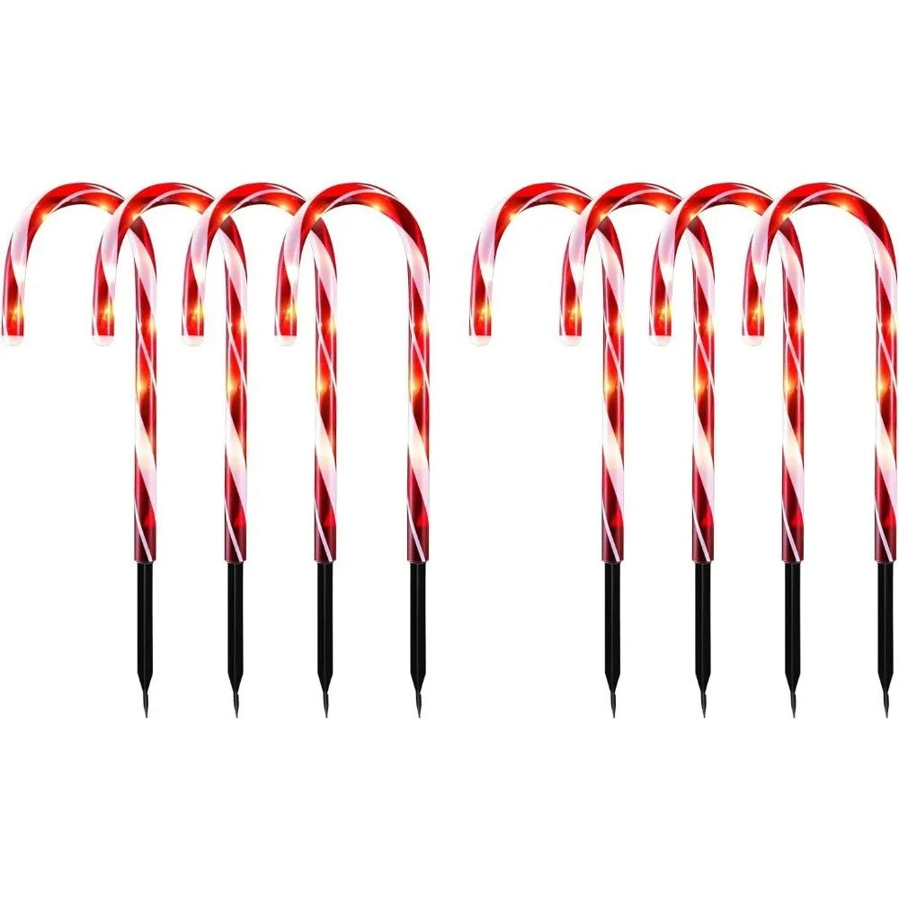 5pcs LED candy cane Christmas lights — battery-powered decorations for garden paths or indoor holiday rooms.